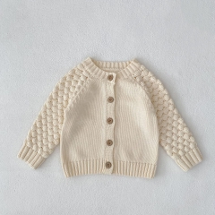 New Arrival Autumn and Spring Infant Baby Unisex Solid Color Geometric Pattern Long Sleeves Single Breasted Knitted Cardigan Wholesale